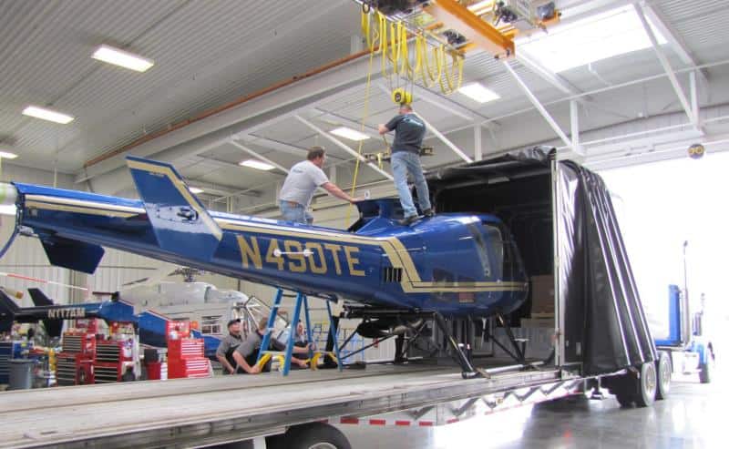 Helicopter loaded on Freight Truck